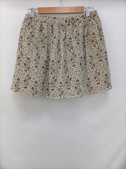 NICOLI. Falda verde flores T.18(38)