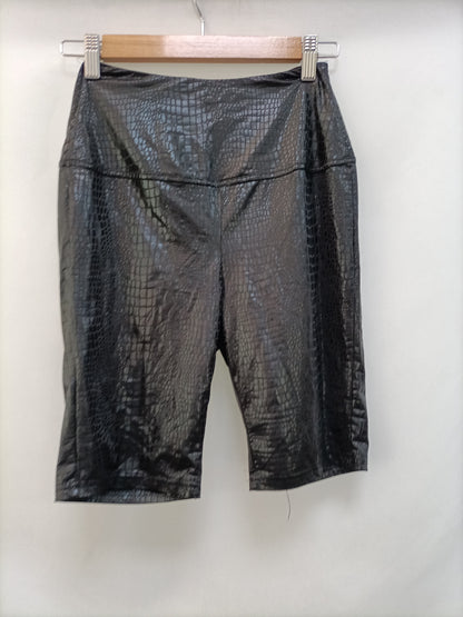 SHEIN. leggins negros cortos T.xs
