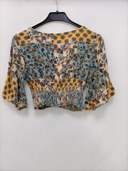 PULL&BEAR. Top estampado flores  T.m