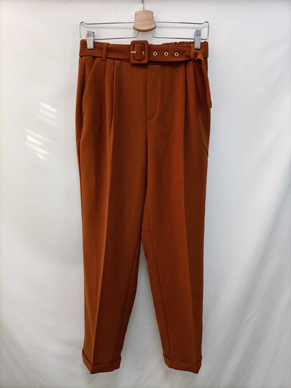 SFERA. Pantalón fluido teja T.38
