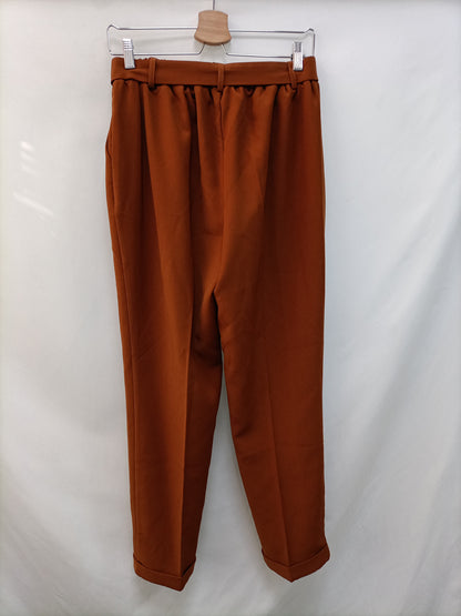 SFERA. Pantalón fluido teja T.38