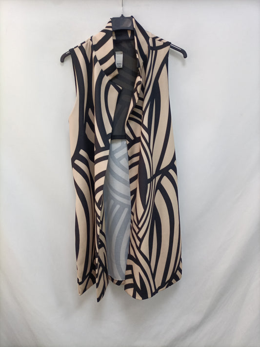 OTRAS. Chaleco rayas negro y beige T.s/m
