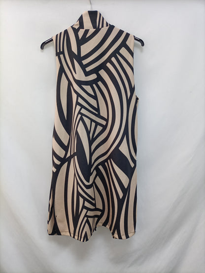 OTRAS. Chaleco rayas negro y beige T.s/m