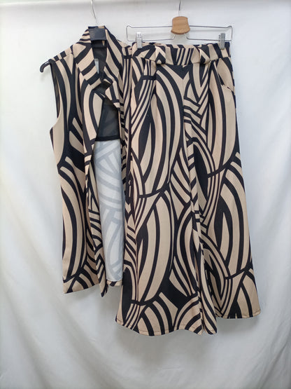 OTRAS. Chaleco rayas negro y beige T.s/m