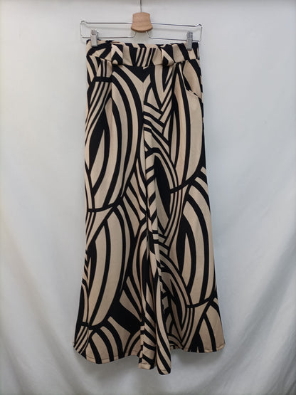 OTRAS. Pantalón beige y negro t.u(s)