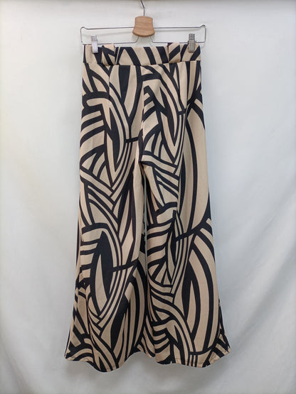 OTRAS. Pantalón beige y negro t.u(s)