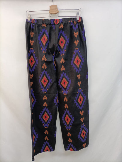 COMPAÑIA FANTASTICA. Pantalón negro estampado T.m