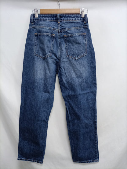 H&M. Pantalón denim ancho oscuro T.34