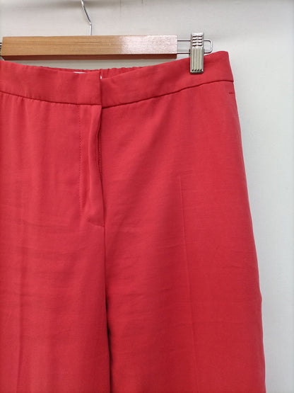 MANGO. Pantalón fluido rojo (coral) T.s