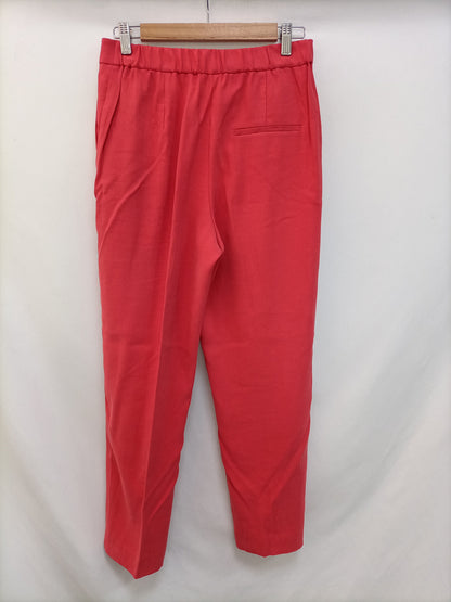 MANGO. Pantalón fluido rojo (coral) T.s