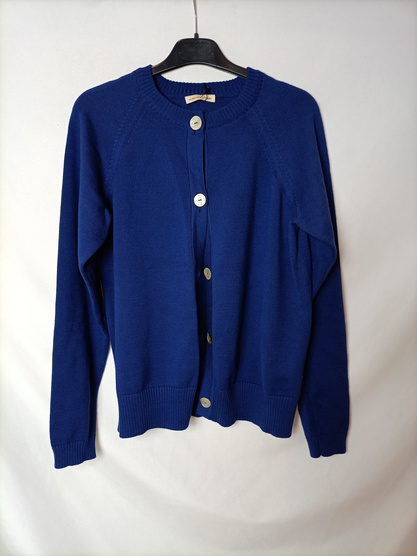 COUNTING CLOUDS.Blue T-shirt button cardigan