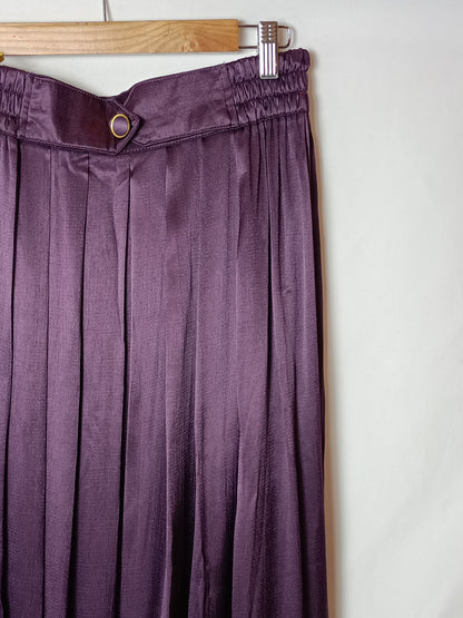 OTRAS. Falda midi burdeos T.42