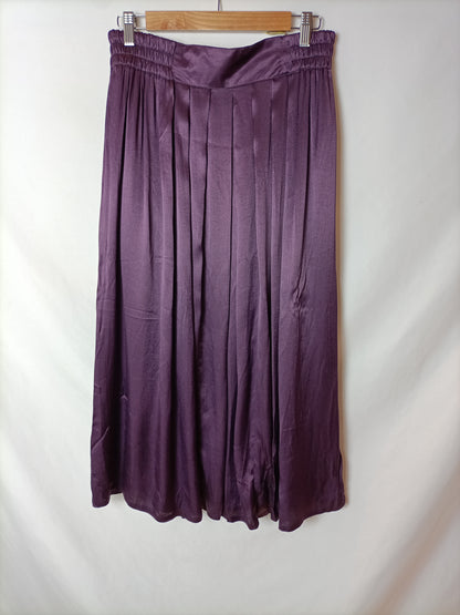 OTRAS. Falda midi burdeos T.42