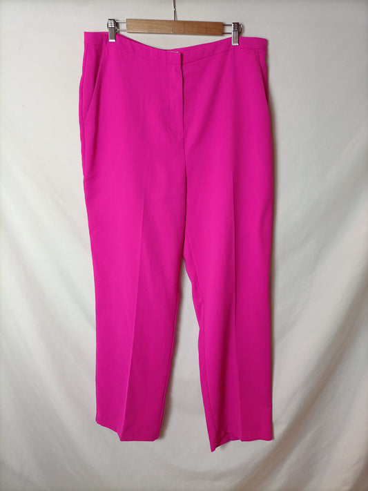 PRIMARK. Pantalón ancho rosa fucsia T.44