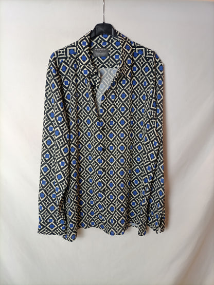 PRIMARK. Tl geometric shapes blouse