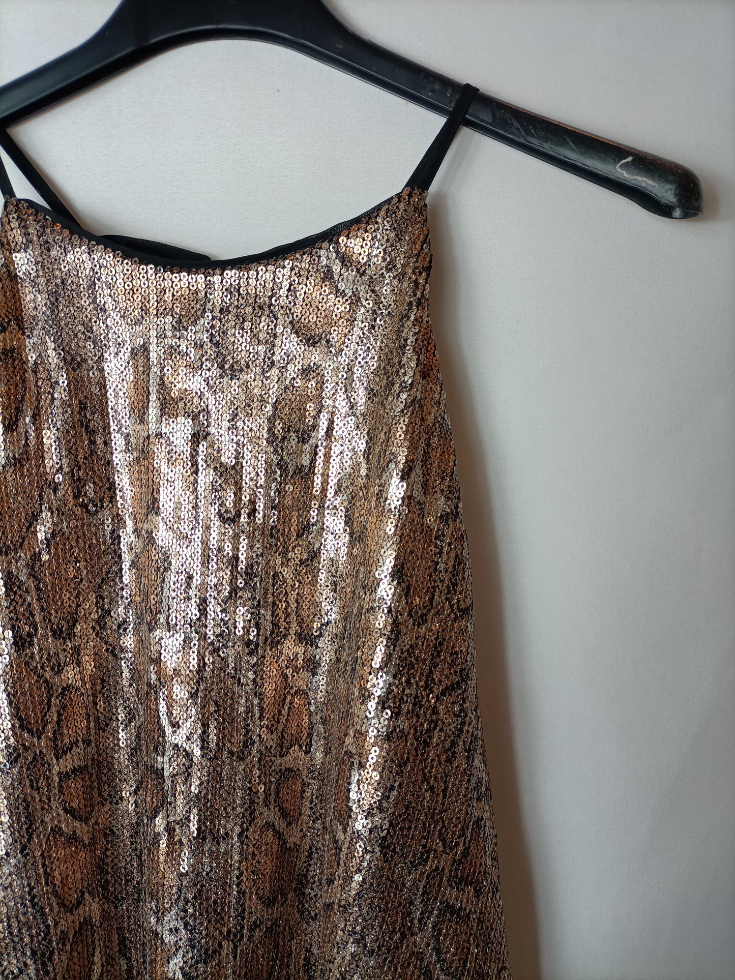 ZARA. Top lentejuelas animal print T.l