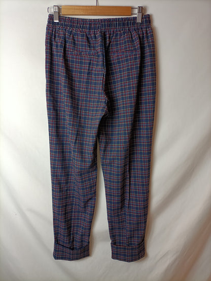 BERSHKA. Checkered pleated trousers. TL