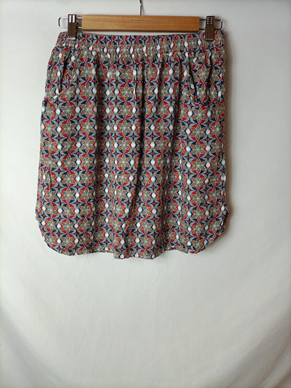 OTRAS. Falda corta estampada. T L (S/M)