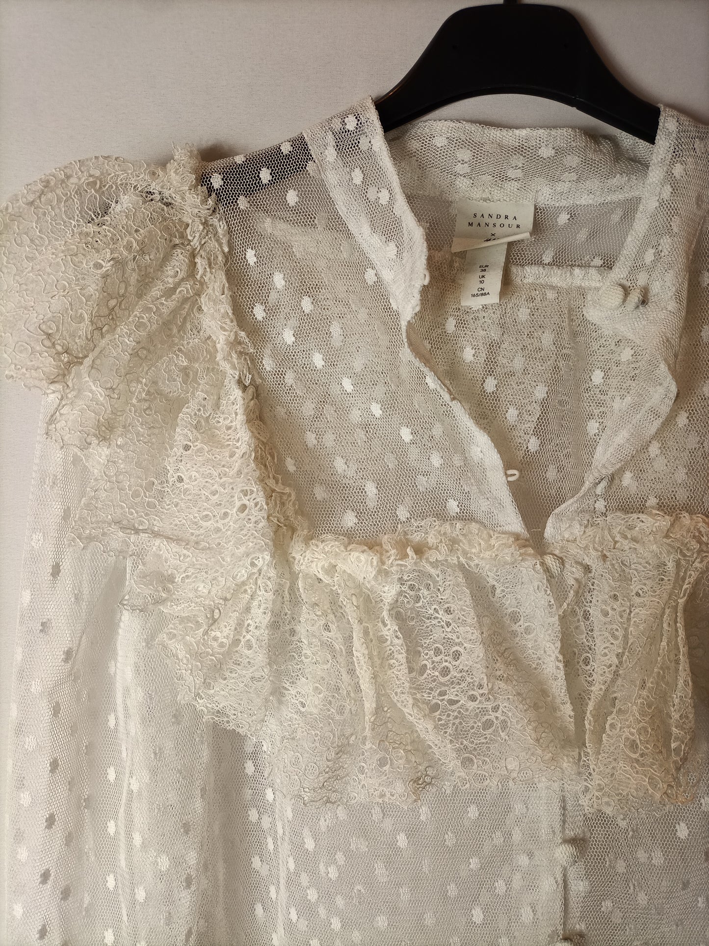 H&M. Top blanco plumeti T.38