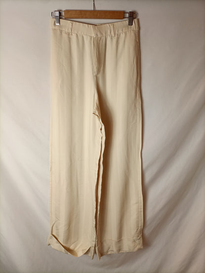 ZARA. Pantalón palazzo beige. T S (Tara)