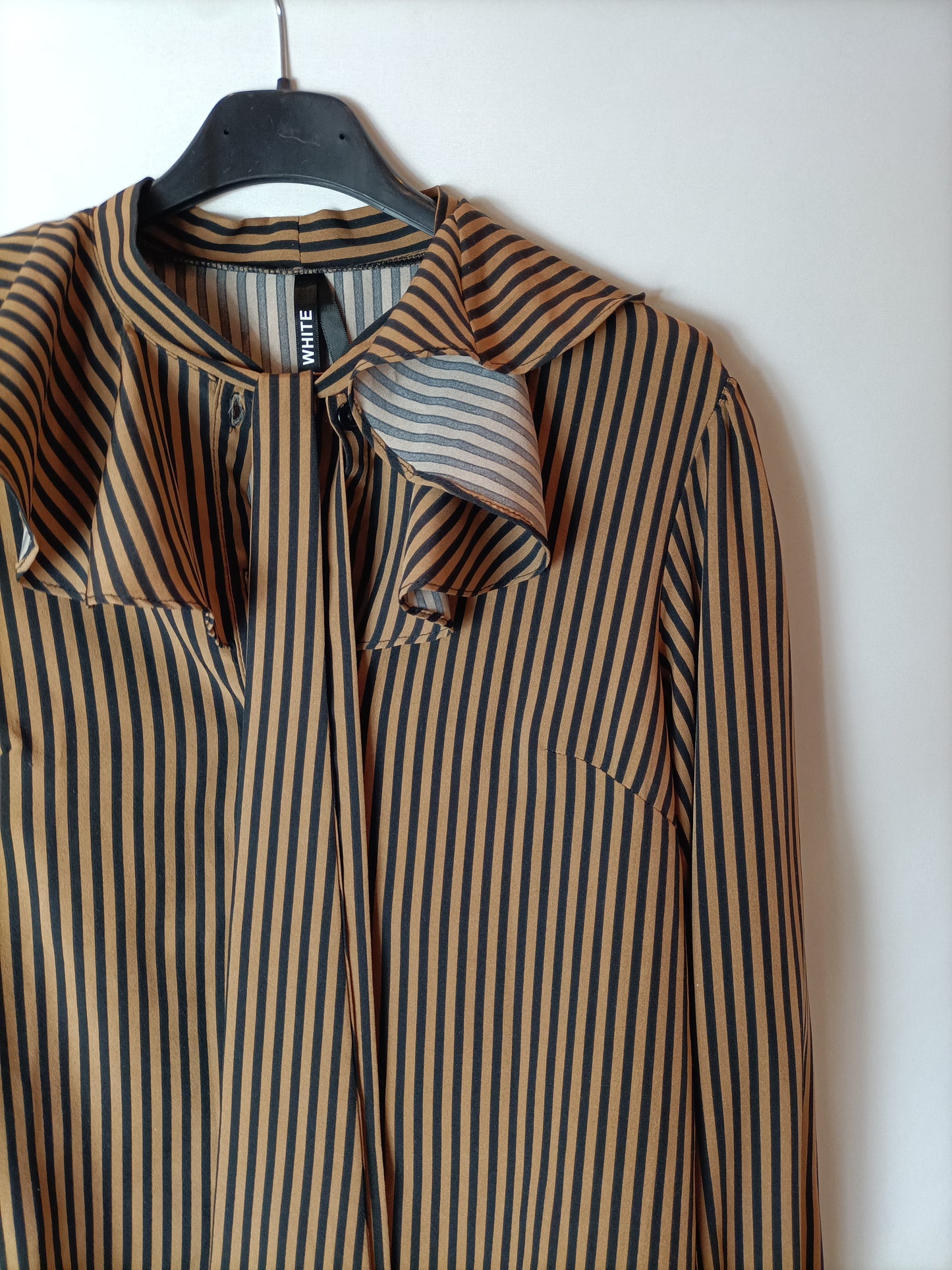 ELLI WHITE. Striped and ruffled Ts blouse