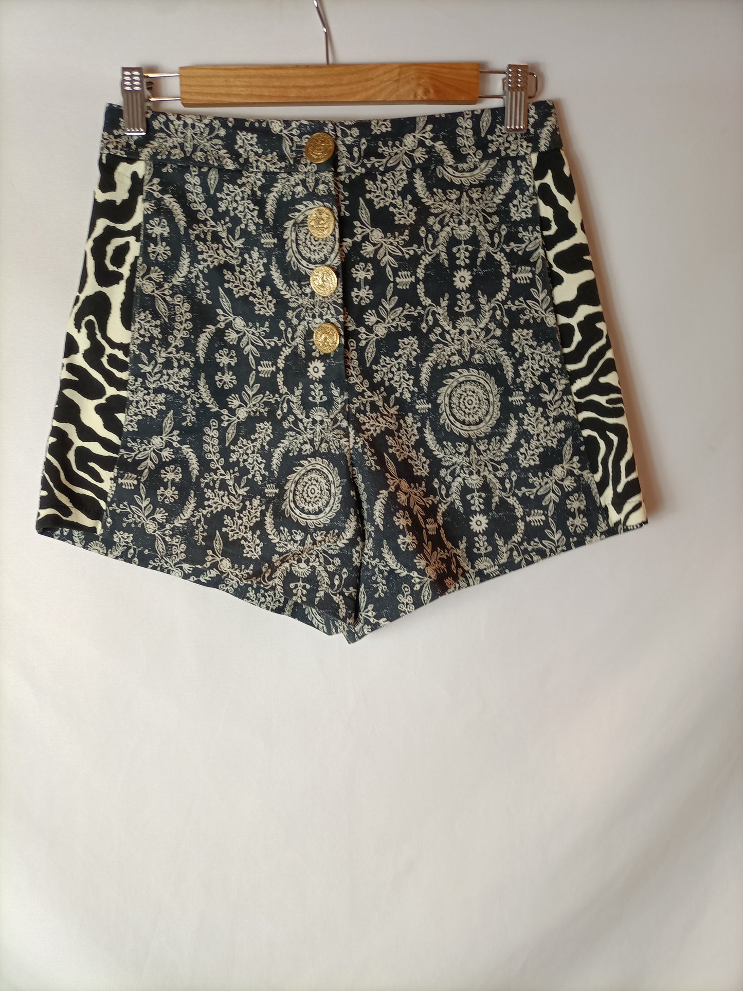 PINKO. Black printed shorts T.36