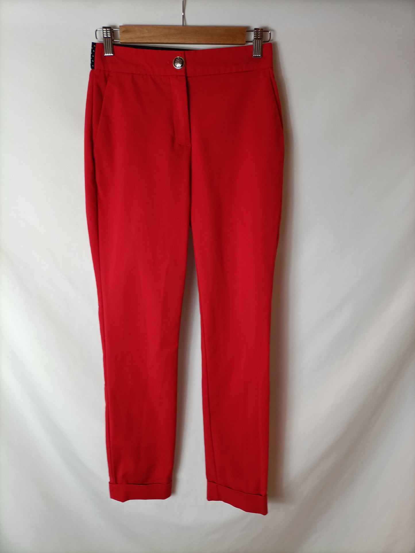ZARA. Pantalones elásticos rojos. T S