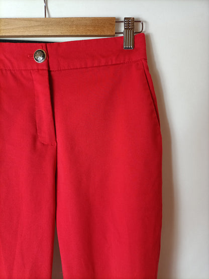 ZARA. Pantalones elásticos rojos. T S