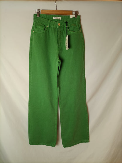 PULL&BEAR. Pantalón "wide leg" verde T.36