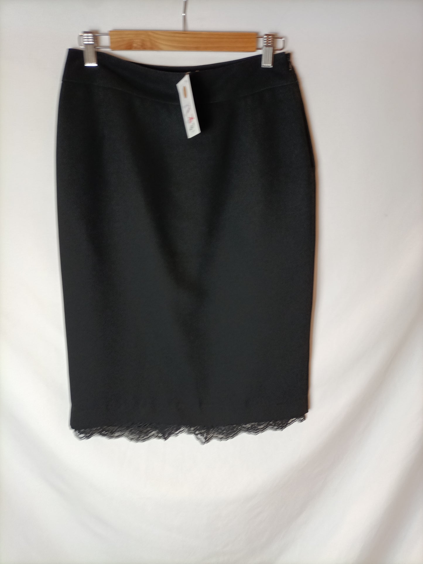 ZARA. Black skirt with lace detail, size 40