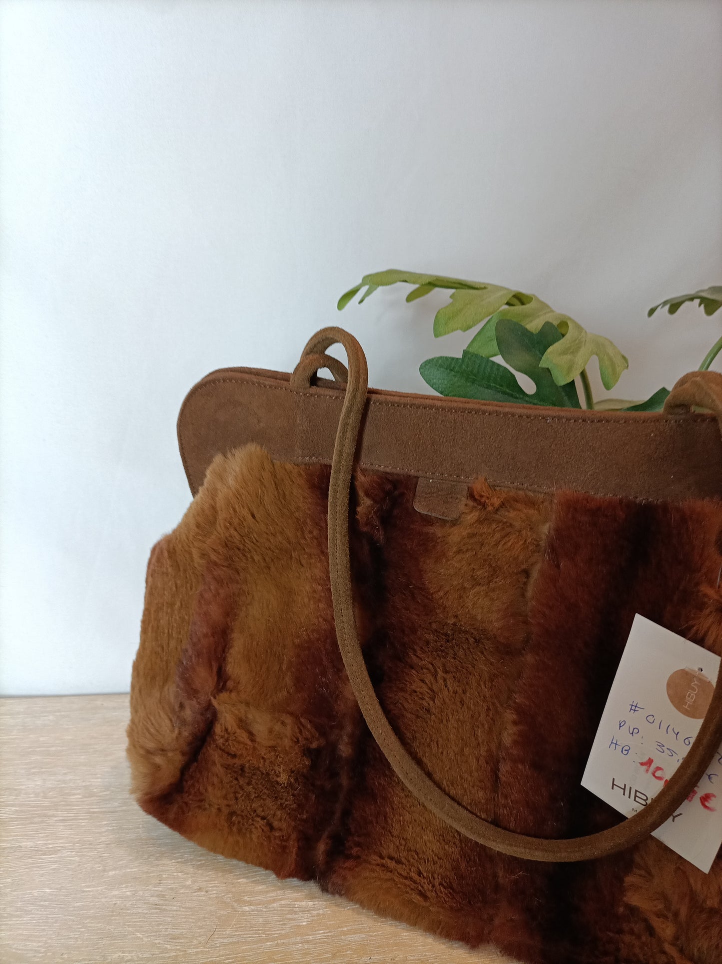 OTRAS. Bolso pelo marrón.