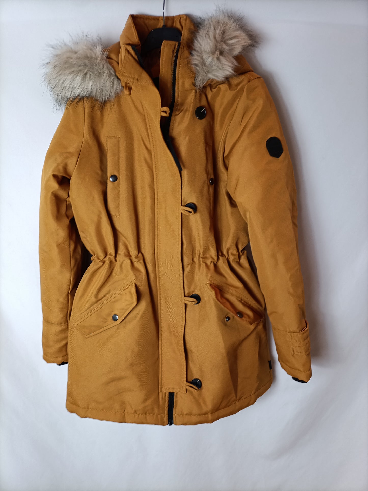 VERO MODA. Parka mostaza capucha T.s