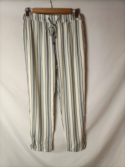 MANGO.Pantalones rayas relajados T.M