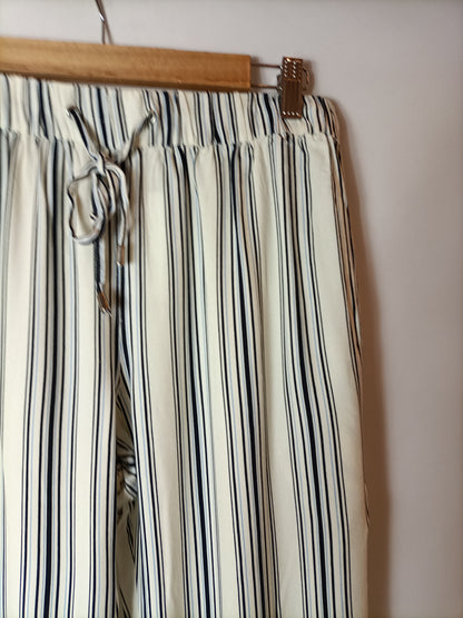 MANGO.Pantalones rayas relajados T.M