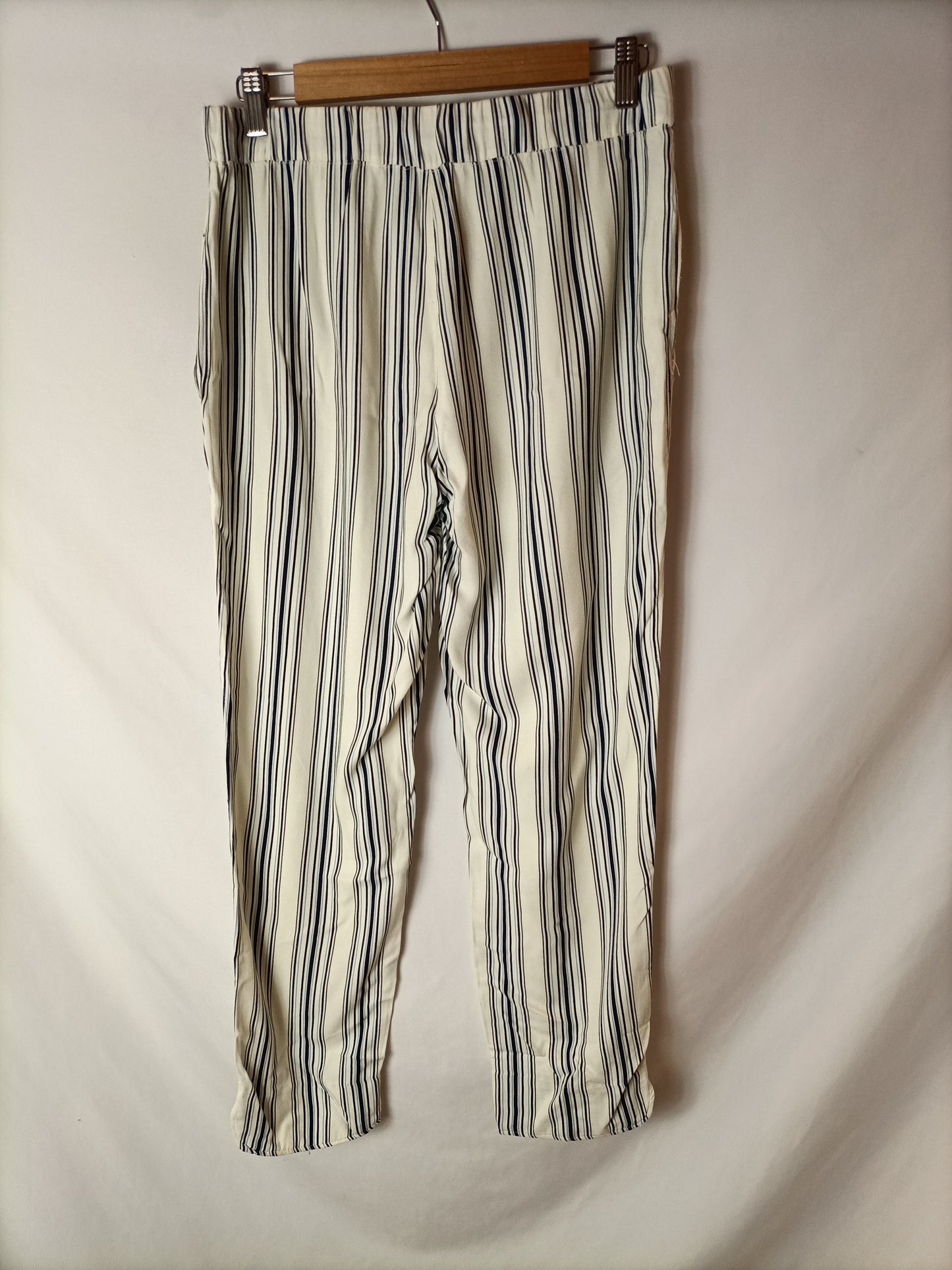 MANGO.Pantalones rayas relajados T.M