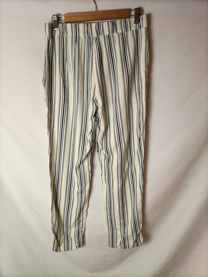 MANGO.Pantalones rayas relajados T.M