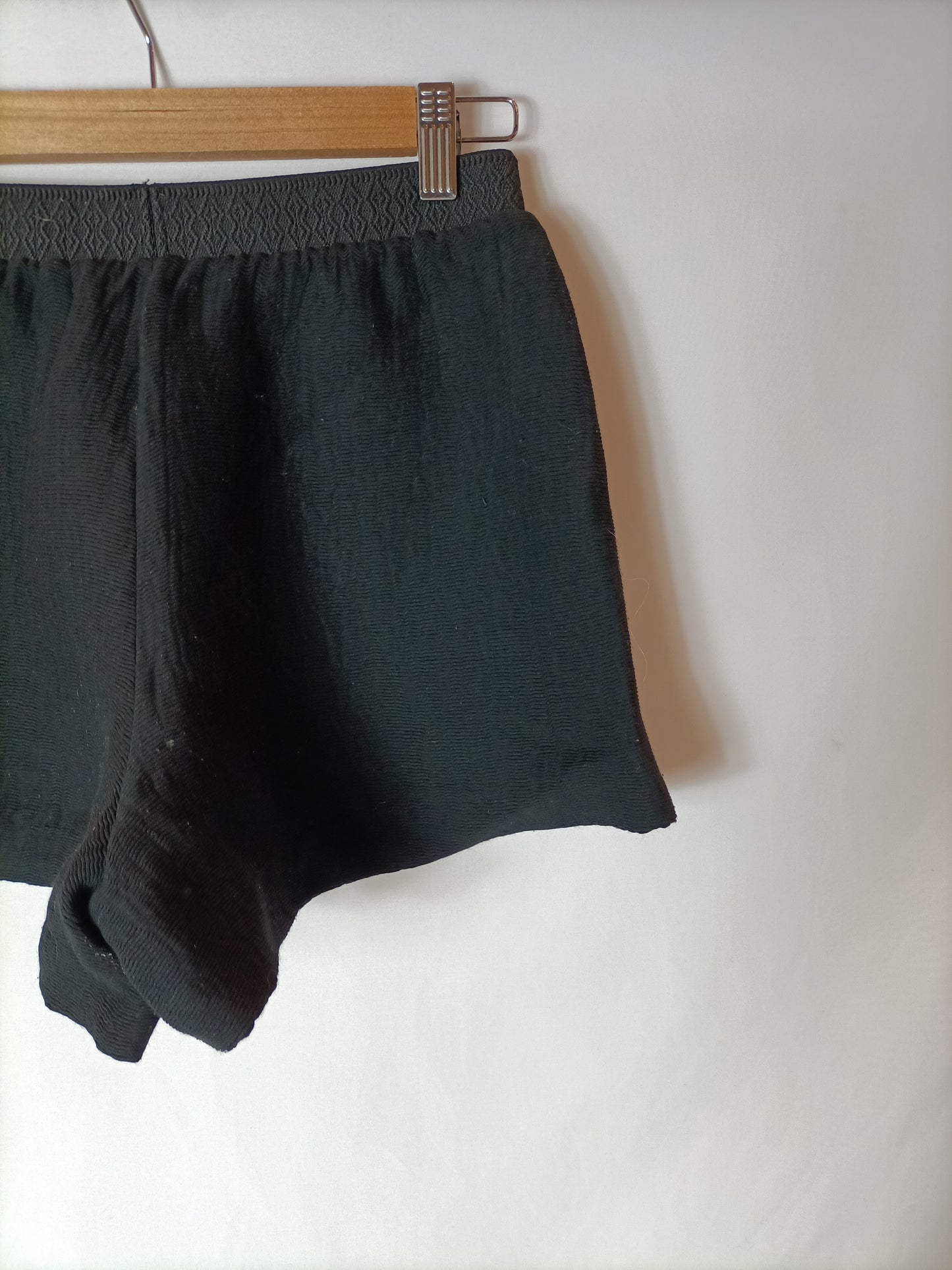 MAJE. Black elastic shorts T.34
