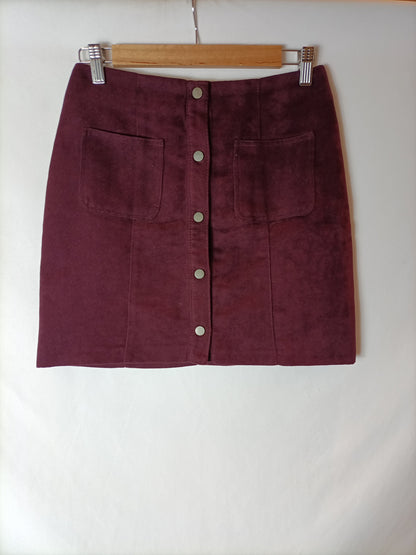 PIMKIE. Falda corta burdeos T.u(36)