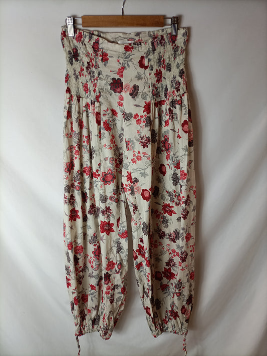 PROMOD. Pantalón bombacho estampado. T M