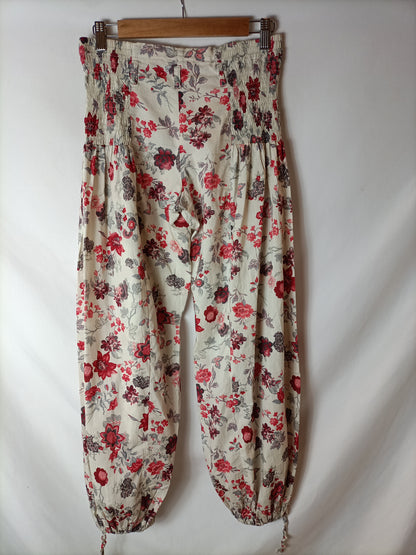 PROMOD. Pantalón bombacho estampado. T M