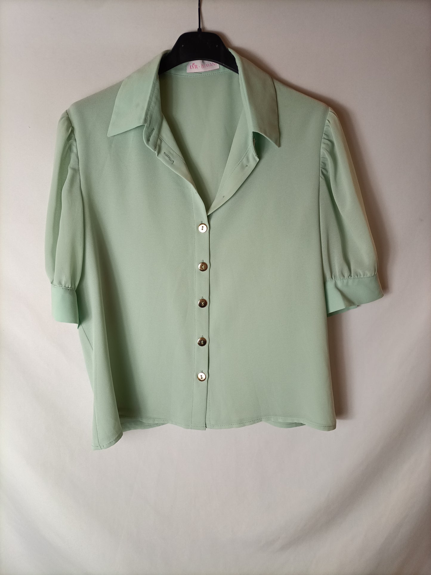 BIMANI. Blusa manga semi transparente. T M