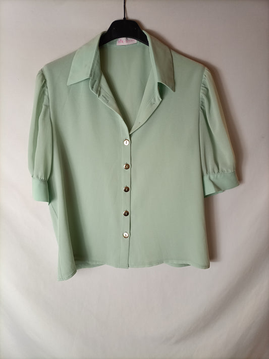 BIMANI. Blusa manga semi transparente. T M