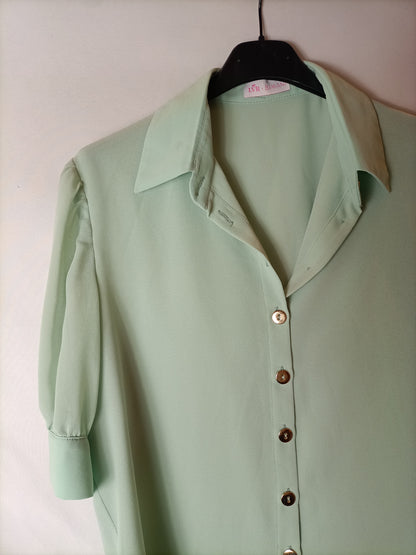 BIMANI. Blusa manga semi transparente. T M