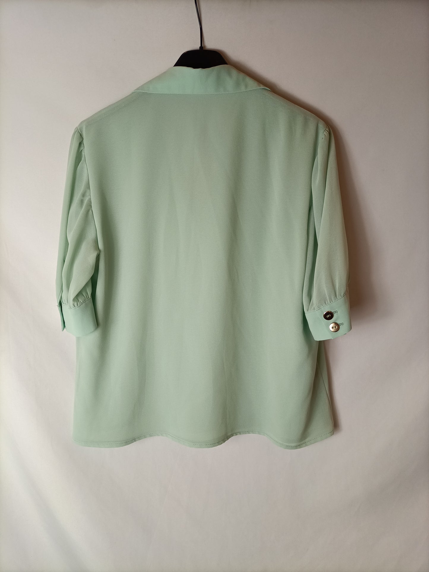 BIMANI. Blusa manga semi transparente. T M