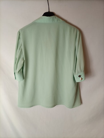 BIMANI. Blusa manga semi transparente. T M