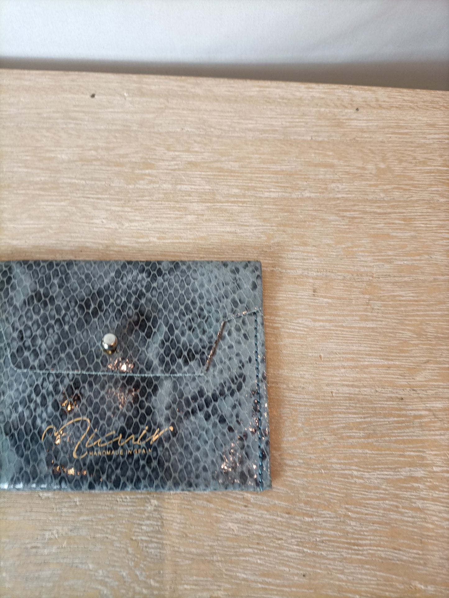 MICUIR. Blue leather print wallet