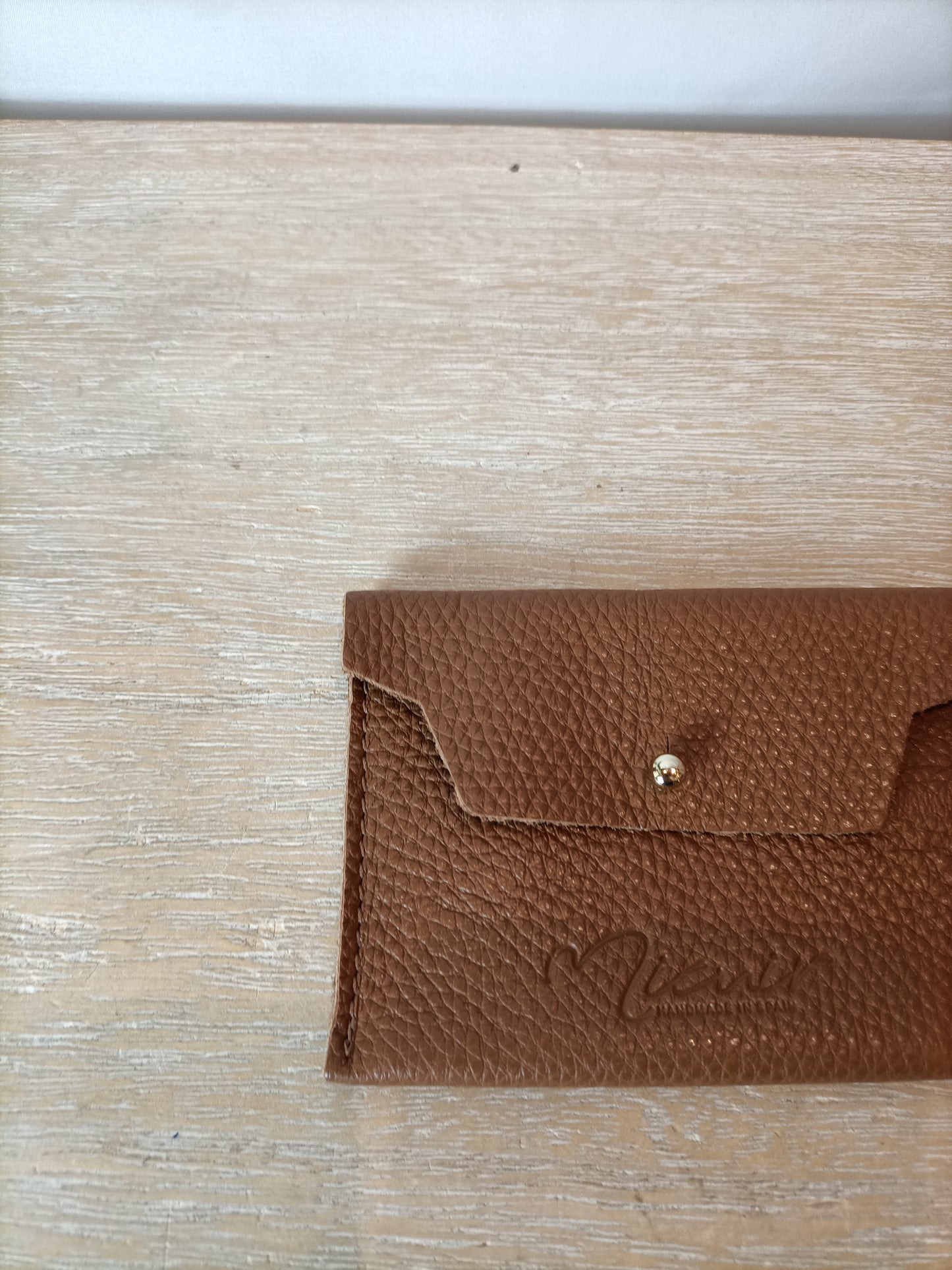 MICUIR. Brown leather wallet