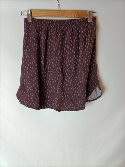 DOUBLE AGENTE. Falda burdeos flechas T.xs