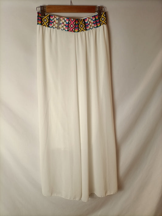 OTRAS. Falda larga blanca cintura étnica. T M