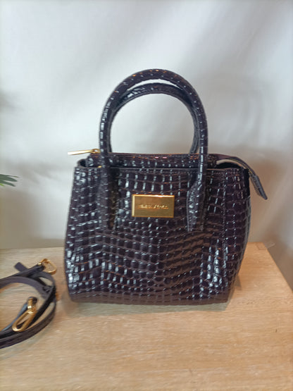 BIMBA Y LOLA. Bolso piel color berenjena oscuro